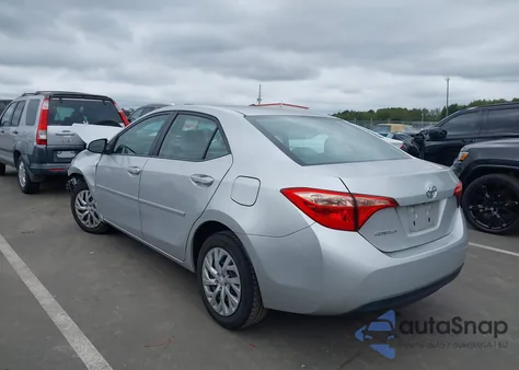2017 Toyota Corolla Le z USA, uszkodzony, nr VIN 5YFBURHE1HP734410